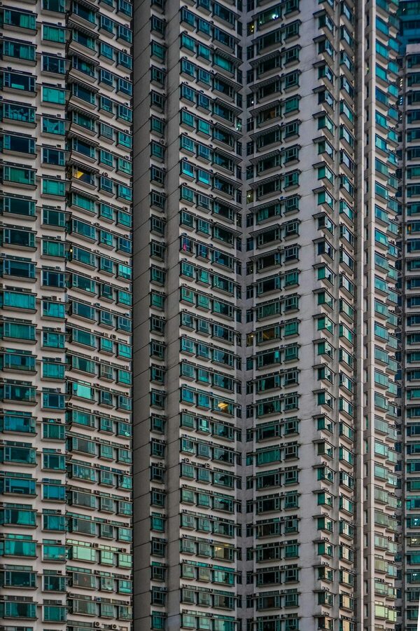 Multifamily apartment building financed through credit-challenged investor loan program