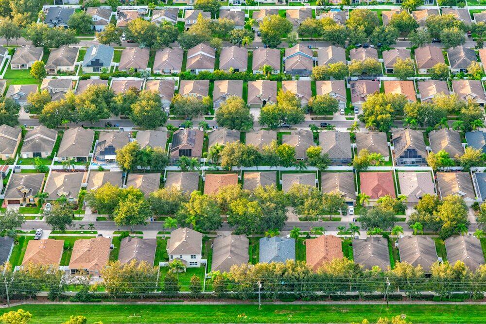 Aerial view of suburban rental property portfolio for blanket loan consolidation
