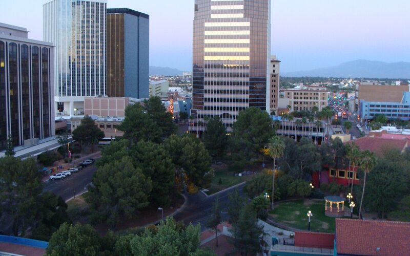 Tucson, Arizona skyline at dusk with mountains in the background