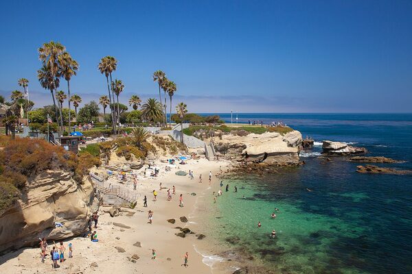 San Diego coastline with La Jolla Cove and beach-goers along the Pacific shore