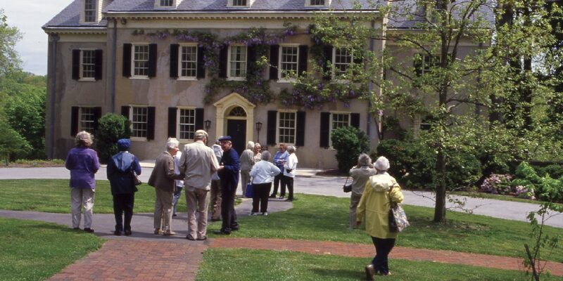 Tour group at Eleutherian Mills, the historic DuPont family home at Hagley Museum