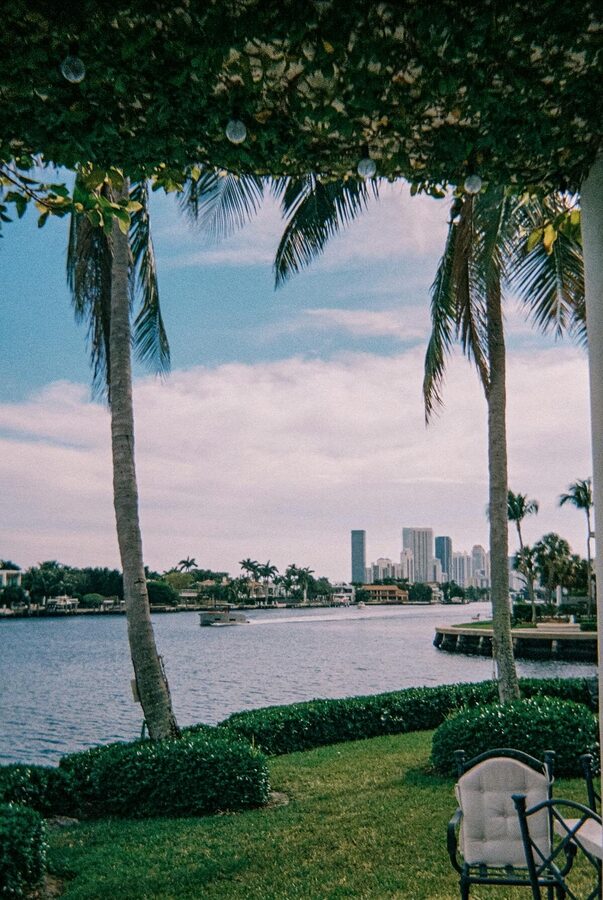 Miami skyline in the distance viewed from a waterfront property on Biscayne Bay
