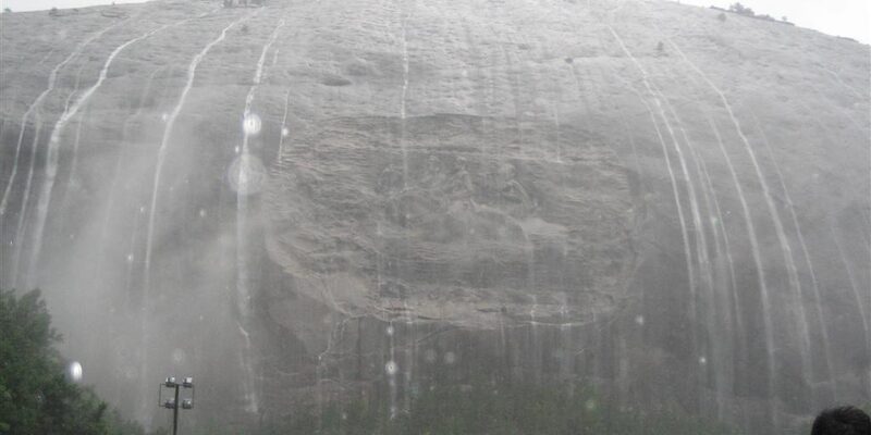 Stone Mountain with massive granite face and surrounding green parkland
