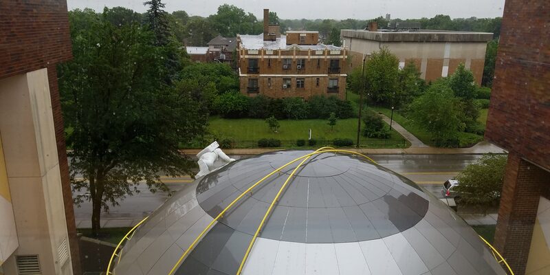 The Children's Museum of Indianapolis exterior with dinosaur sculptures