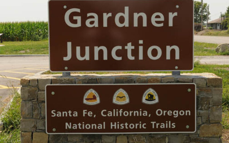 New residential subdivision in Gardner Kansas with two-story homes wide streets and young trees in a growing community