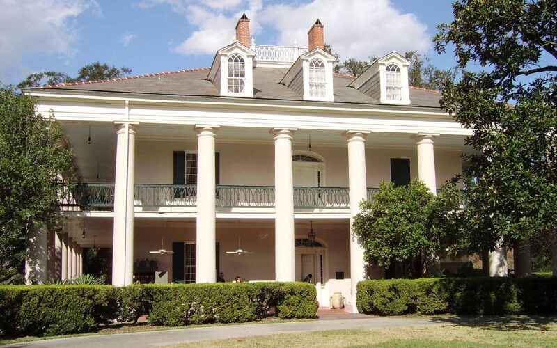 Stately antebellum plantation house with columns and galleries along Louisiana's River Road