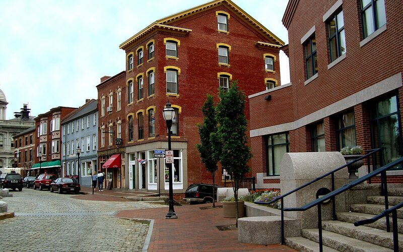 Portland Old Port historic district with cobblestone streets, brick buildings, and waterfront dining in Maine