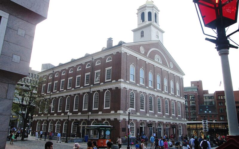 The Freedom Trail winding through downtown Boston past historic red-brick buildings and Faneuil Hall