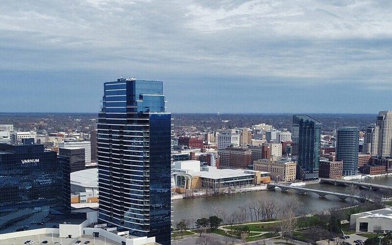 Grand Rapids Michigan skyline along the Grand River with downtown bridges and mixed-use development