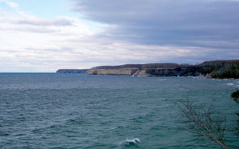 Distant view of sandstone cliffs at Pictured Rocks National Lakeshore on Lake Superior