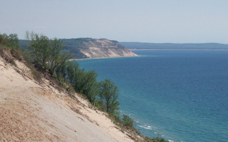 Towering sand dunes overlooking Lake Michigan at Sleeping Bear Dunes National Lakeshore