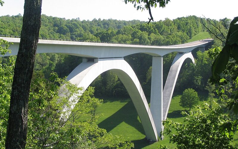 Natchez Trace Parkway Double Arch Bridge spanning a wooded valley