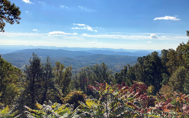 Mountain overlook with layered blue ridges along the Blue Ridge Parkway in North Carolina