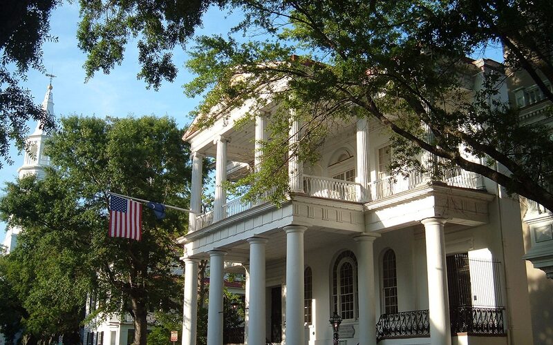 White antebellum mansion with columns in historic Charleston, South Carolina