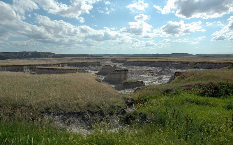 Dramatic layered rock formations and eroded buttes at Badlands National Park in South Dakota