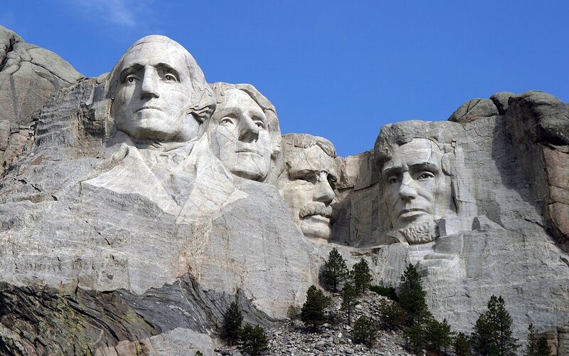Mount Rushmore National Memorial featuring the carved faces of Presidents Washington, Jefferson, Roosevelt, and Lincoln in the Black Hills of South Dakota