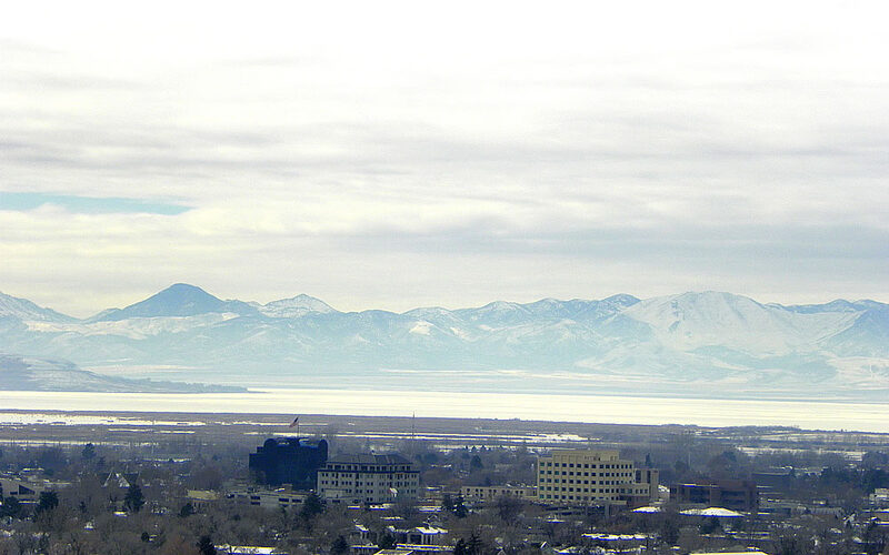Distant landscape view across the Provo, Utah valley with mountains