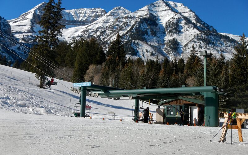 Sundance Mountain Resort chairlift base area with snow-covered mountains in Utah
