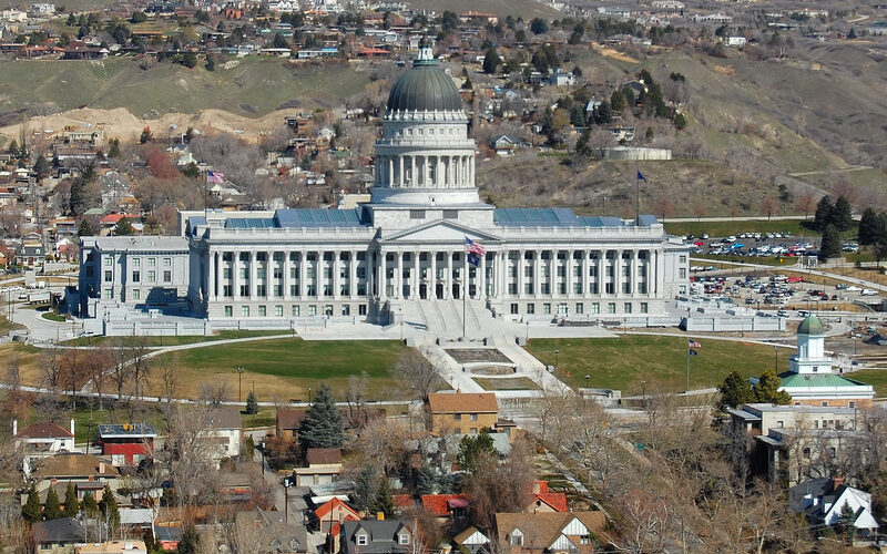 Utah State Capitol building in Salt Lake City with the Wasatch Mountains in the background