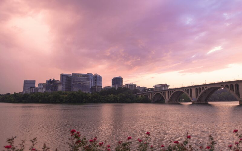 Rosslyn skyline at sunset from across the Potomac River with Key Bridge
