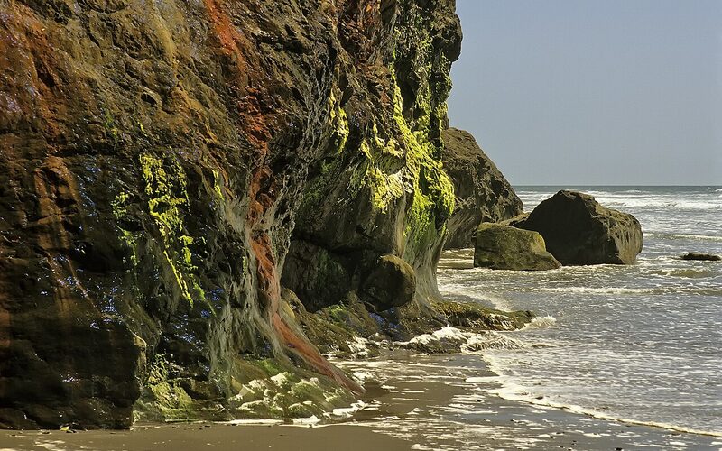 Rocky coastal cliff with ocean waves on the Pacific coast of Olympic National Park