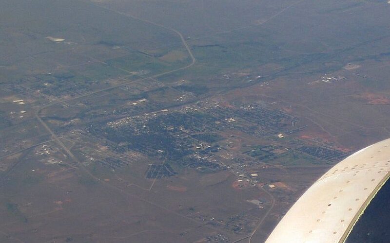 High-altitude aerial view of Laramie, Wyoming from an airplane
